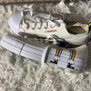 men size  7

Women size 9

Converse All-Star Family unit with Rainbow Accents
